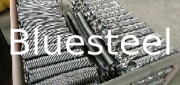 Torsion Spring yang disesuaikan untuk pintu rol dengan arah gulungan tangan kanan dan tertutup dan tipe ujung tanah